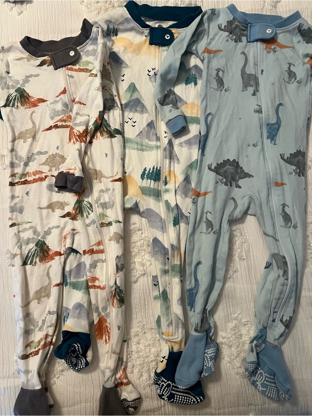 5 pair lot of 12 month Burt’s bees baby footie pajamas- dino themed.
